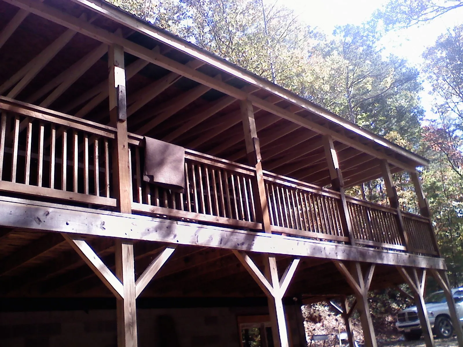 Timber framing under a new elevated porch and deck — Roof Leak Repair in Glen Carbon by Roofing Brothers